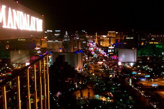 2-Hour Vegas Strip Walking Tour with Photos,Champagne & Vintage Vegas Goody Bags - New York-New York: a lively start with Liberty views