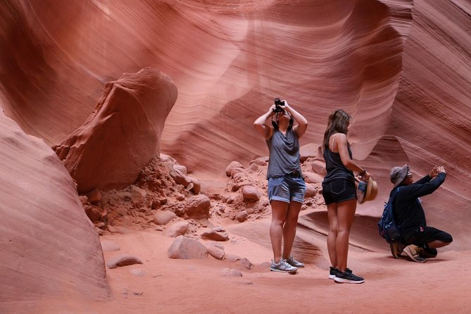 Antelope Canyon Luxury Private Tour from Las Vegas - Walking through Lower Antelope Canyon with a Navajo guide
