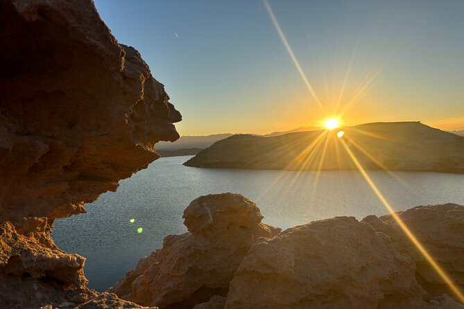 Emerald Cave Sunset Glow Kayak Tour: 3 Caves, Wildlife & Lights - Quiet coves, snacks, and a possible swim