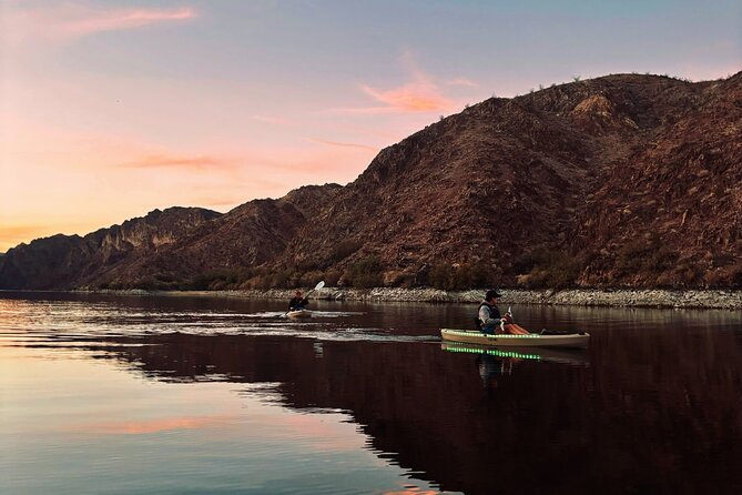 Emerald Cave Sunset Glow Kayak Tour: 3 Caves, Wildlife & Lights - The glowing return beneath the sunset