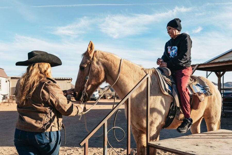 From Las Vegas: Desert Sunset Horseback Ride with BBQ Dinner - Meeting the horses and getting ready to ride