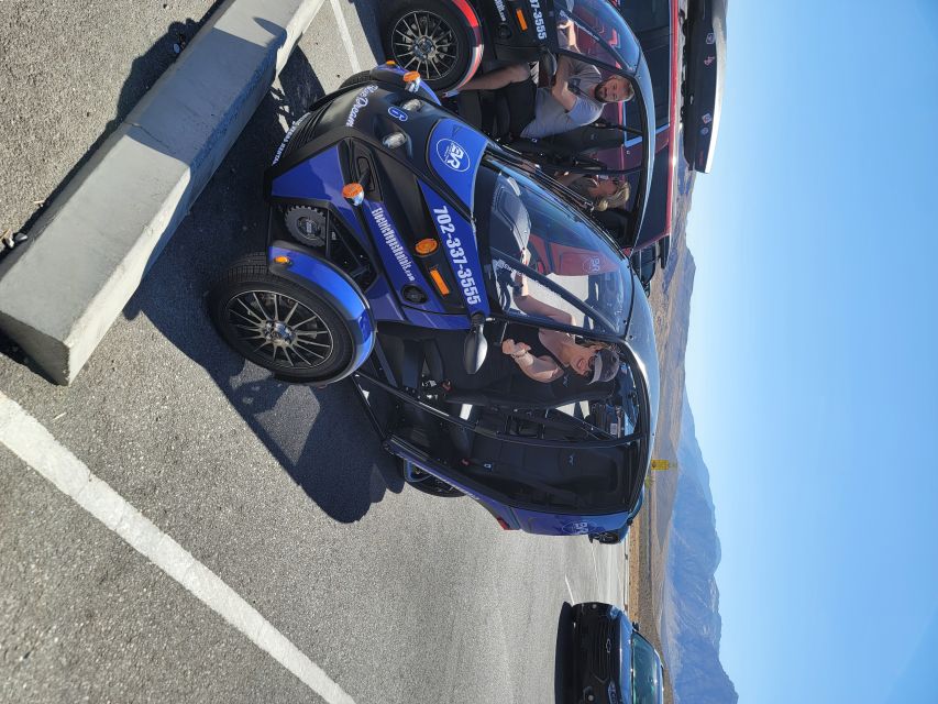 From Las Vegas: Red Rock Electric Car Self Drive Adventure - Returning through downtown Las Vegas