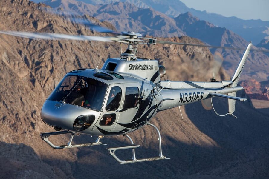 From Vegas: Grand Canyon Helicopter with Eagle Point Landing - Flying below the Grand Canyon West Rim