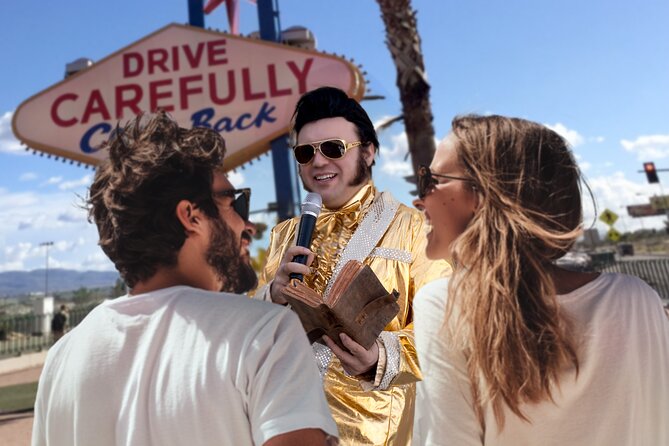 Gold Elvis Wedding or Vow Renewal at Las Vegas Sign - Who will enjoy this Elvis wedding most