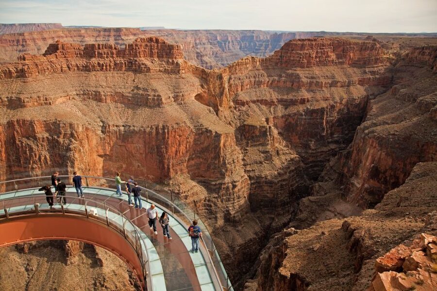 Las Vegas: Grand Canyon Helicopter Air Tour with Vegas Strip - Flying below the Grand Canyon rim