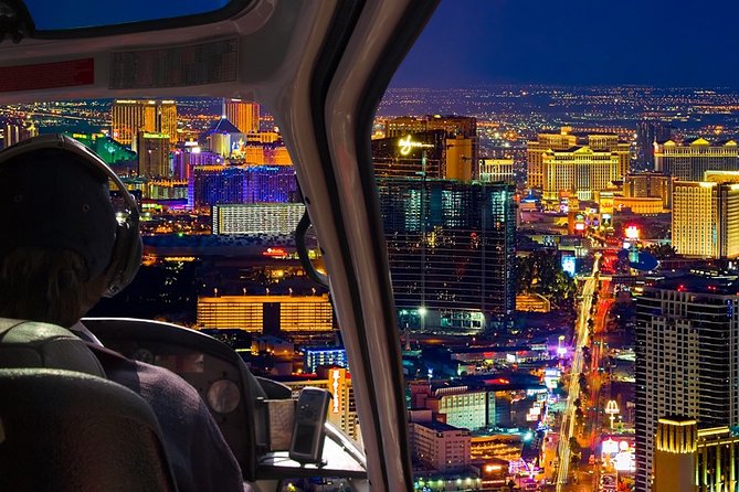 The Las Vegas Strip lit up at night, seen from the air